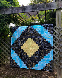 Available now: Throw size quilt, geometry, yellow black blue
